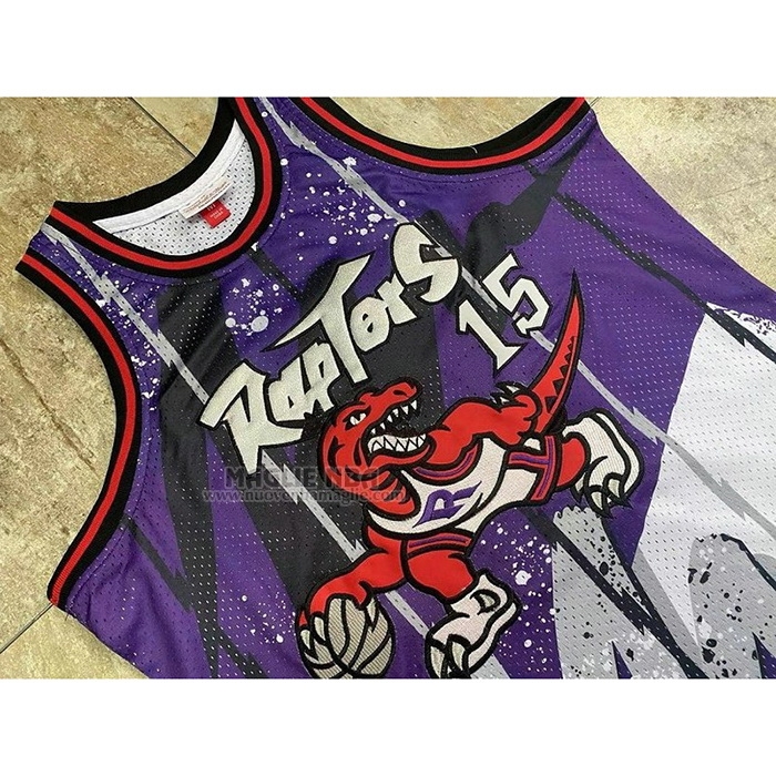 Maglia
 Vince Carter NO 15 Toronto Raptors Mitchell & Ness 1998-99 Viola
